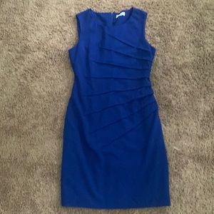 Beautifully tailored classy dress for any occasion, slightly worn.